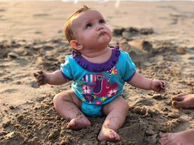 in-vitro-fertilization-treatment-beyond-infertility-baby-born-by-ivf-playing-at-the-beach